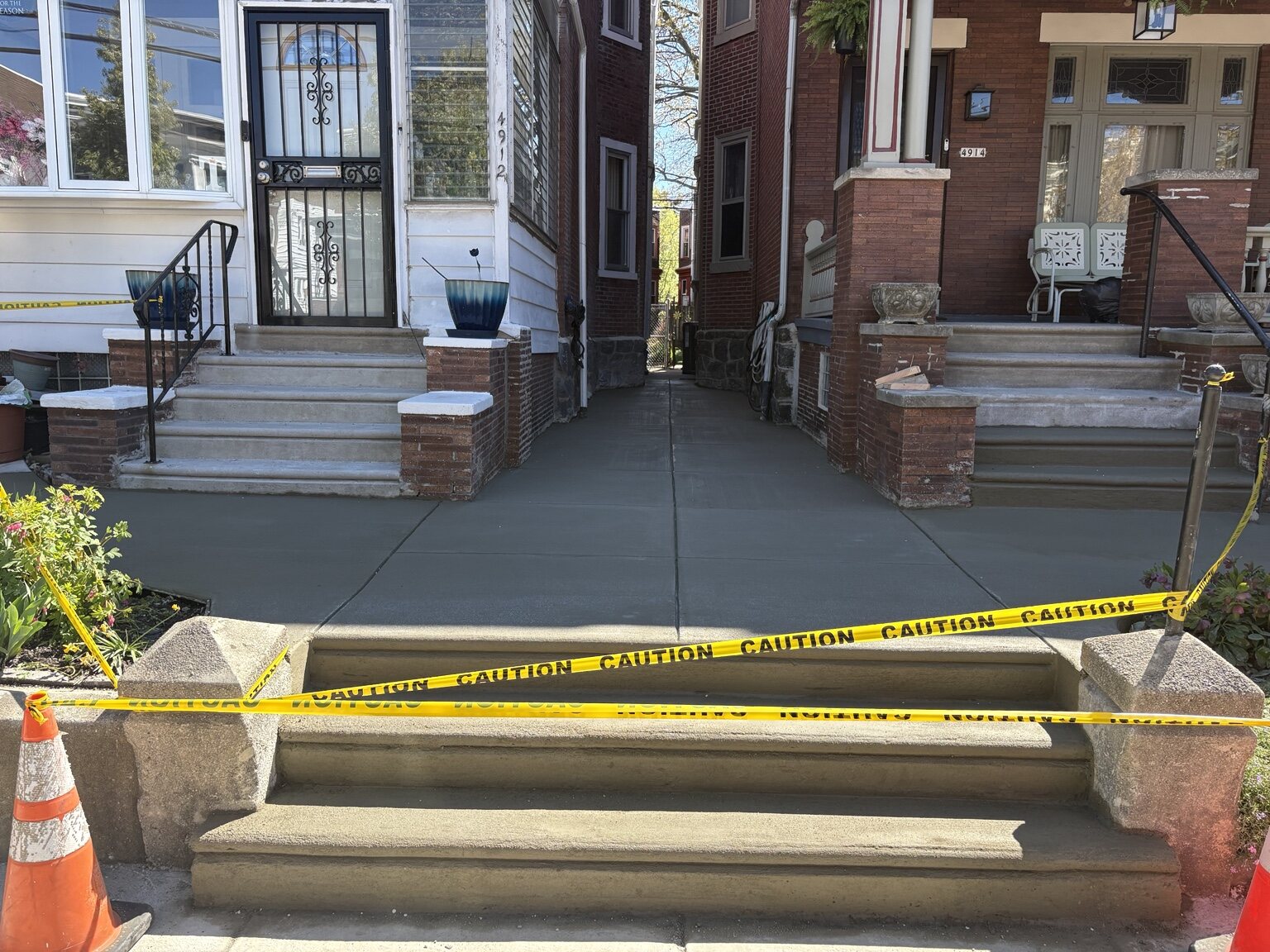 New concrete walkway and front entrance