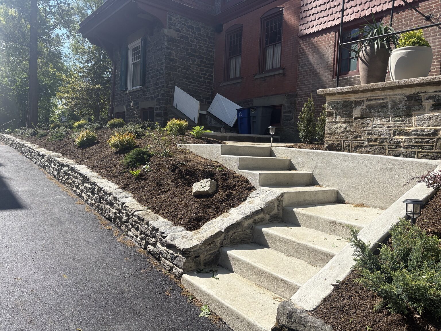 Concrete landscape steps and stone border