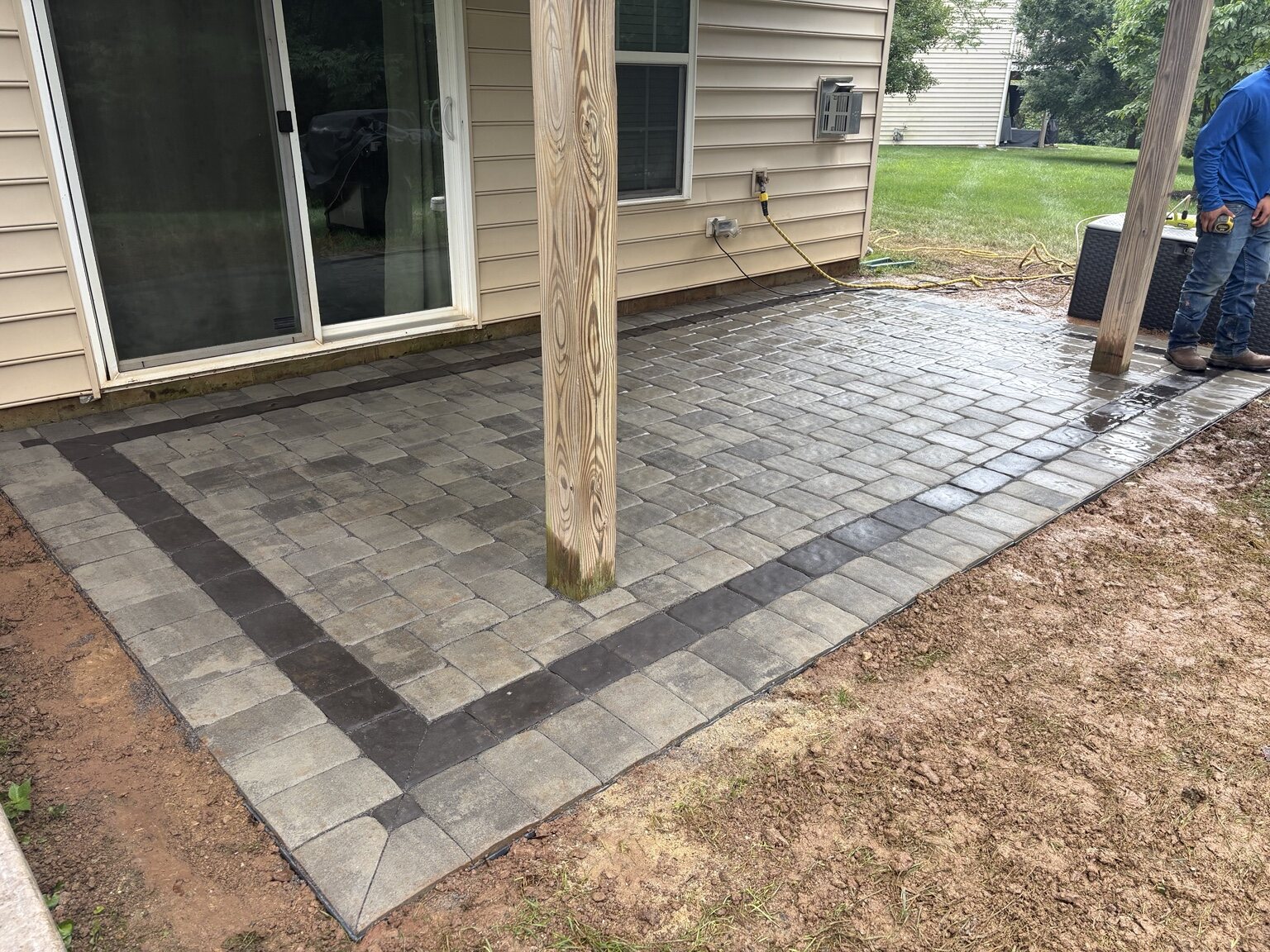 Completed two-tone paver patio
